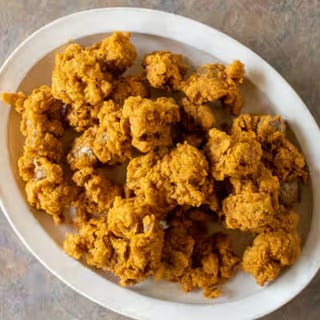 10 Gizzards with Fries & Roll